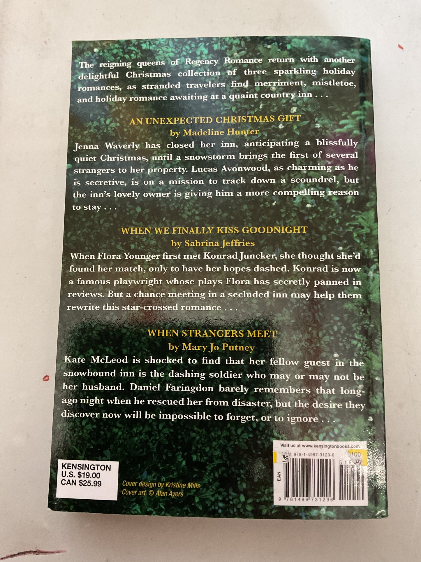 A Yuletide Kiss - by Madeline Hunter & Sabrina Jeffries & Mary Jo Putney (Paperback)