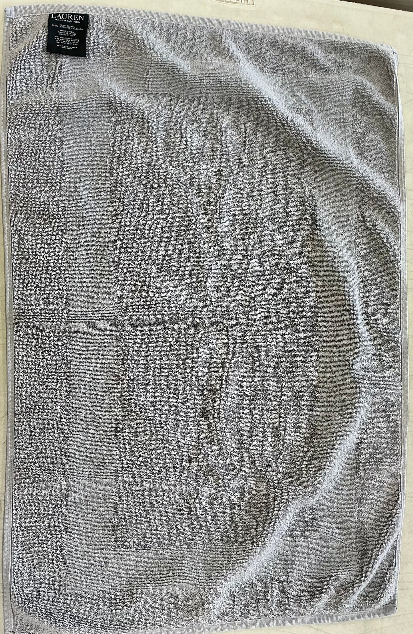 Grey Lauren Ralph Lauren 100% cotton bath mat.