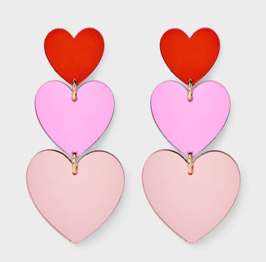 Mirrored heart drop earrings in a red and pink color scheme