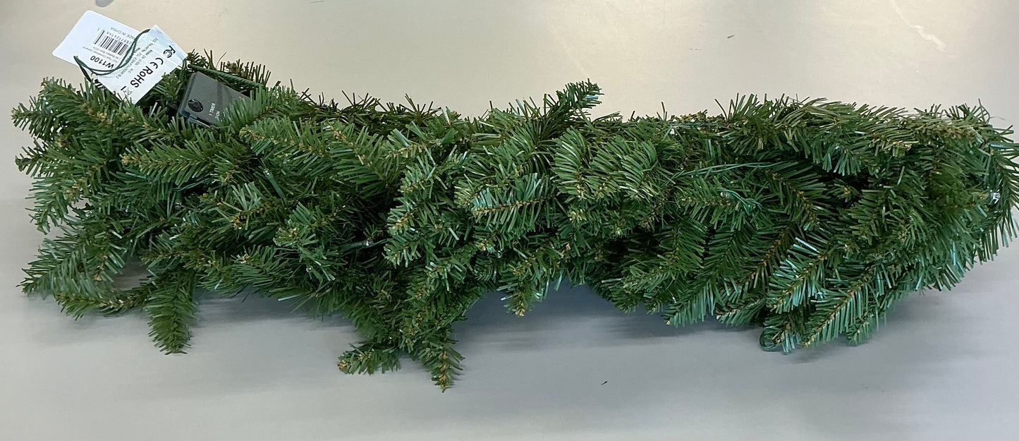 9-foot Nearly Natural Christmas Pine Artificial Garland features 50 pre-strung warm white LED lights and is designed for indoor