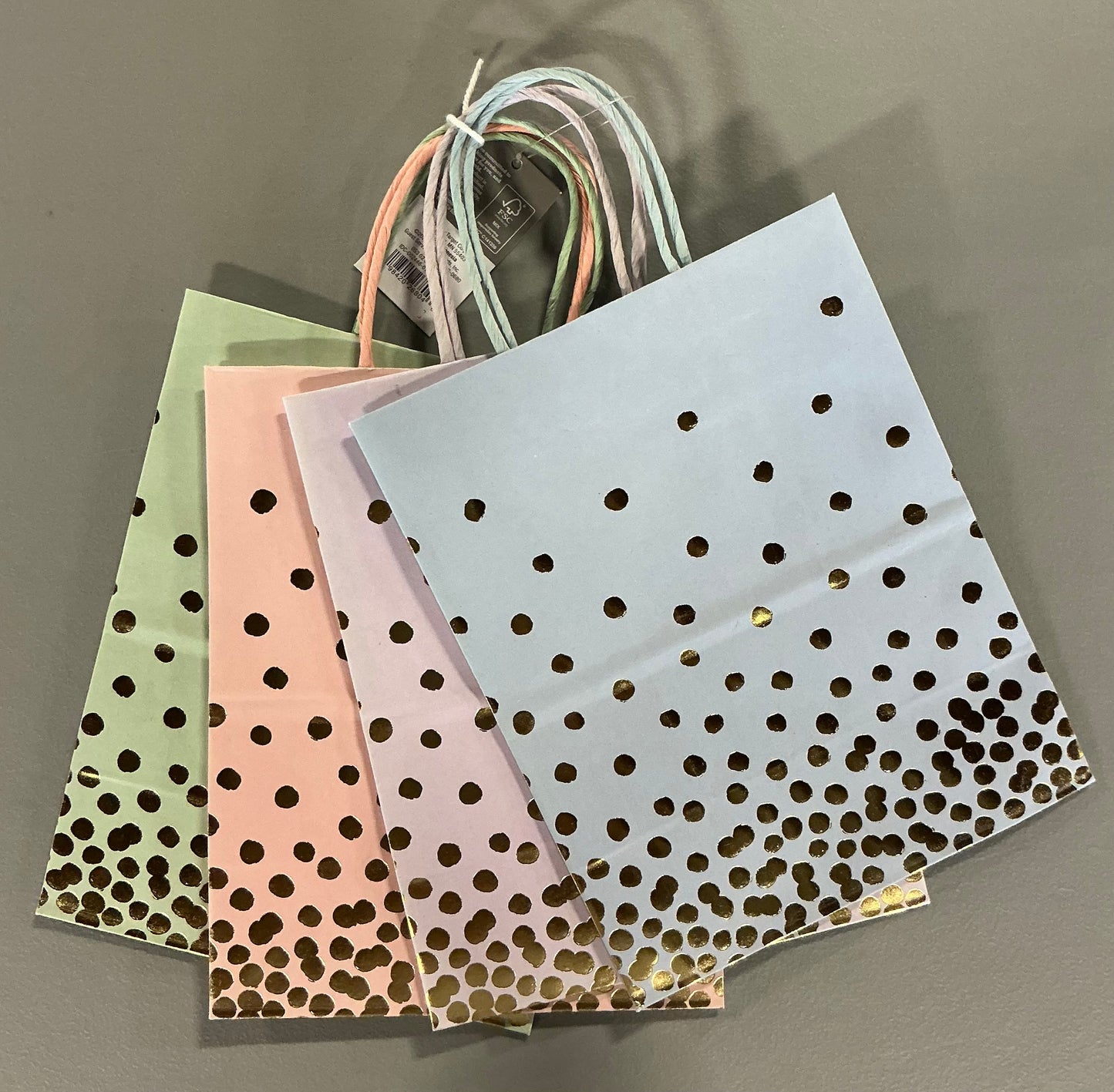 Gift Wrapping Bundle (includes 1 Tote, 1-(25sq ft)Blue Gift Wrap, 1 Clear Bow, 2 White Bows, 2 White Curling Ribbons, 2 (4 color) Curling Ribbons, 1 Curly Pink Bow, 1 (4 color) XS Gift Bags (slight damage, see picture), 1 (4 color) Small Bags)