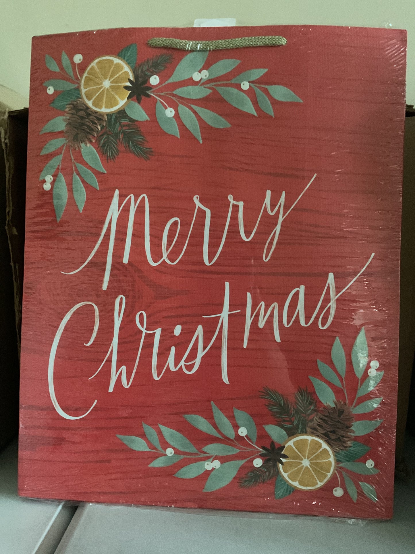 Christmas “Merry Christmas” gift bag with orange design