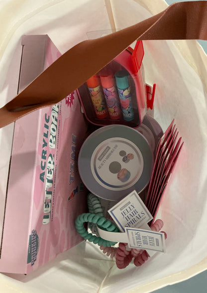 Let’s Get Pretty Party Bundle (includes 1 Bulletin Board, 3 hair ties, 3 Round Beauty Cases, 3 Rectangle Beauty Mirror Cases, 6 Nail Stickers, 2 sets of Lip Smackers, 1 Tote)