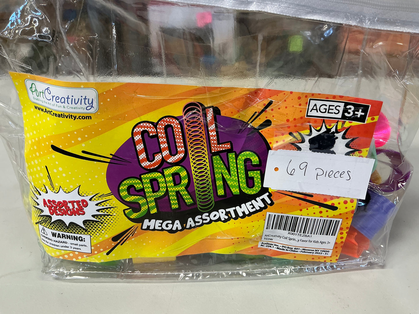 Spring Toy Assortment, Pack of 69 Mini Plastic Coil Springs - Repackaged(see pictures)