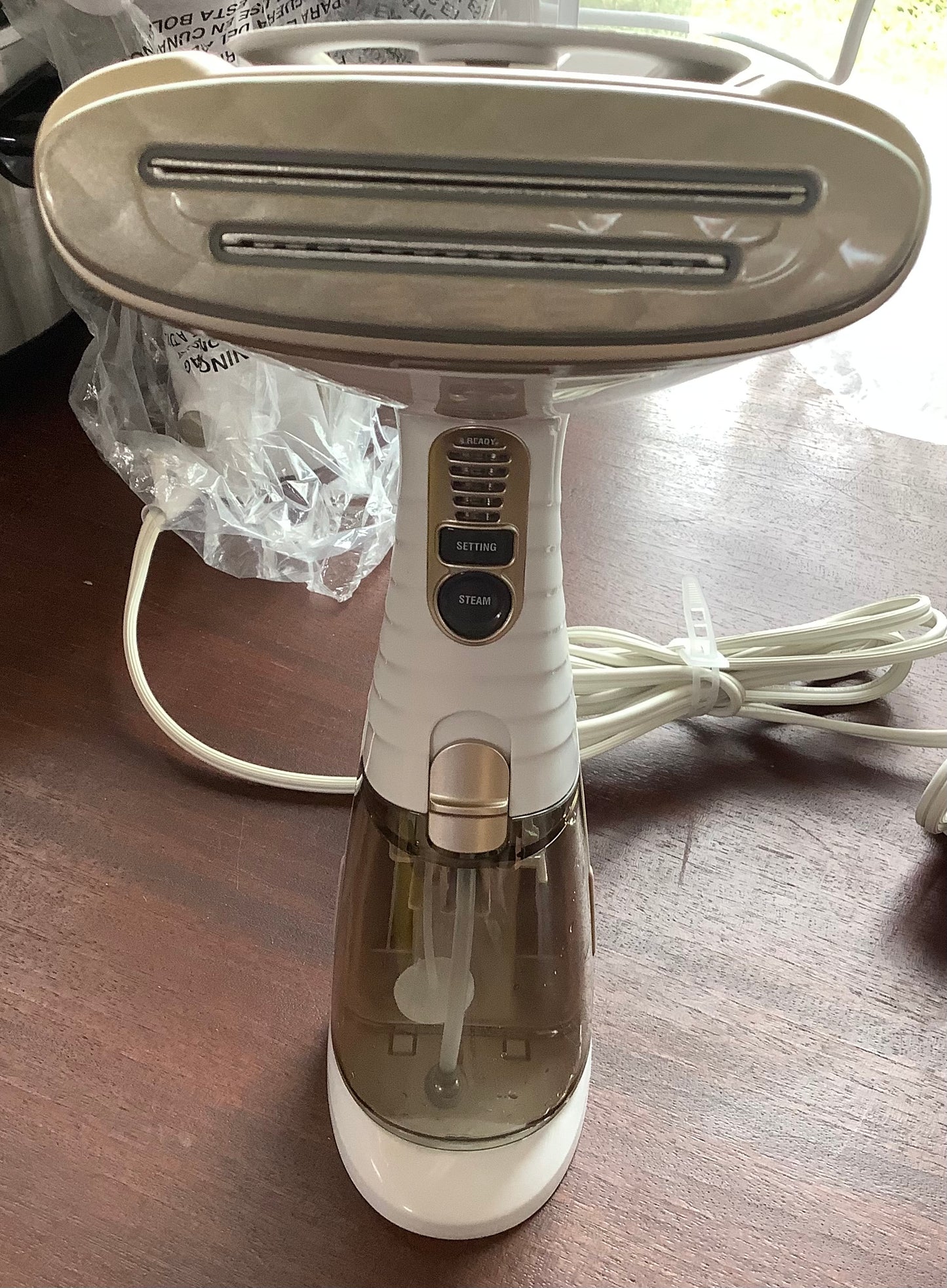 THRIFTY 70-Conair Turbo ExtremeSteam Handheld Garment Steamer:
1875W, 20 Min Steam, 6.6oz Tank, Aluminum Sole Plate, 9'
Cord