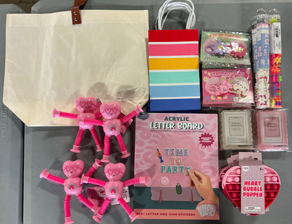Girl’s Party Bundle (includes 1 Bulletin Board, 4 Heart Bubble Poppers, 2 Pink & 2 White Picture Frames (Holds 2.13”x3.39” instant photo), 4 Building Blocks, 4 Pink Heart Pop Figures, 2 Flower & 2 Bunny Straw Toppers, 4 Gift Bags & 1 tote