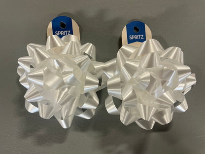 Gift Wrapping Bundle (includes 1 Tote, 1-(25sq ft)Blue Gift Wrap, 1 Clear Bow, 2 White Bows, 2 White Curling Ribbons, 2 (4 color) Curling Ribbons, 1 Curly Pink Bow, 1 (4 color) XS Gift Bags (slight damage, see picture), 1 (4 color) Small Bags)
