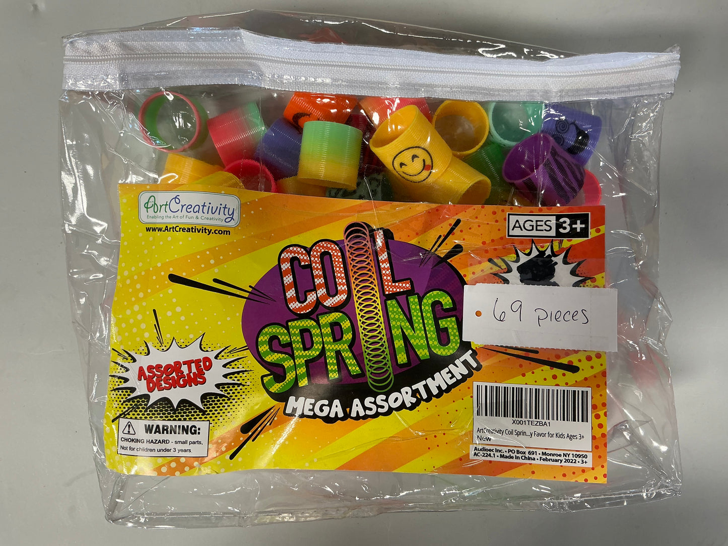 Spring Toy Assortment, Pack of 69 Mini Plastic Coil Springs - Repackaged(see pictures)