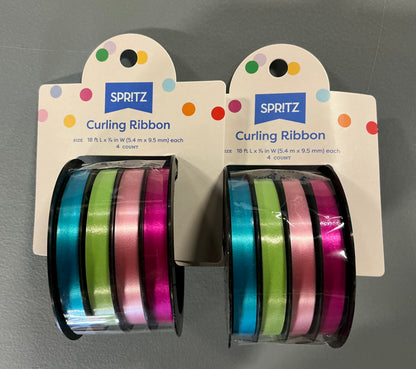 Gift Wrapping Bundle (includes 1 Tote, 1-(25sq ft)Blue Gift Wrap, 1 Clear Bow, 2 White Bows, 2 White Curling Ribbons, 2 (4 color) Curling Ribbons, 1 Curly Pink Bow, 1 (4 color) XS Gift Bags (slight damage, see picture), 1 (4 color) Small Bags)