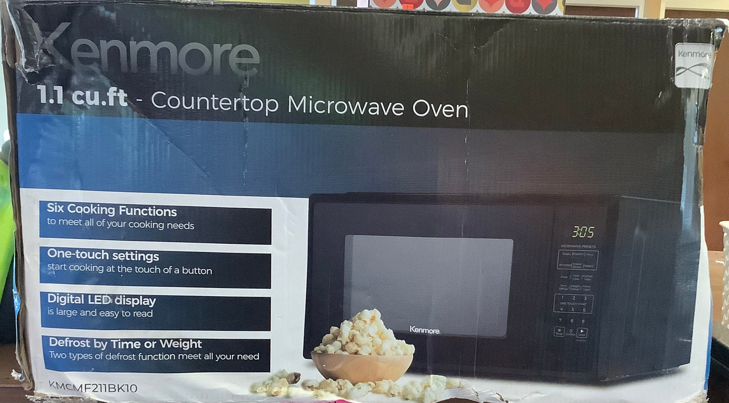 (Clearance )FINAL SALE.Kenmore 1.1 cu ft Microwave - Black: Countertop Oven,
1000W, Child Lock, 6 Programs,