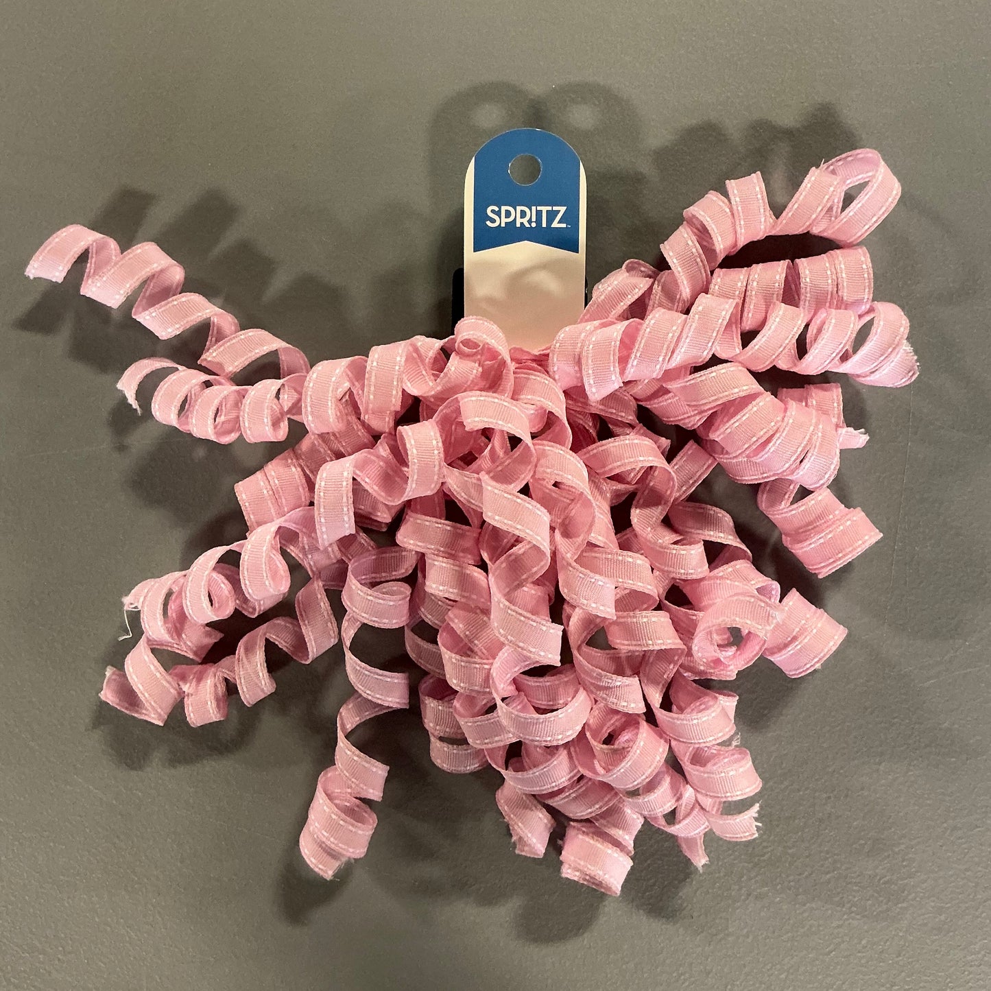 Gift Wrapping Bundle (includes 1 Tote, 1-(25sq ft)Blue Gift Wrap, 1 Clear Bow, 2 White Bows, 2 White Curling Ribbons, 2 (4 color) Curling Ribbons, 1 Curly Pink Bow, 1 (4 color) XS Gift Bags (slight damage, see picture), 1 (4 color) Small Bags)