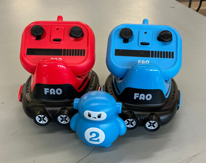 FAO Schwarz bot bumper cars remote control set - As-is missing red guy