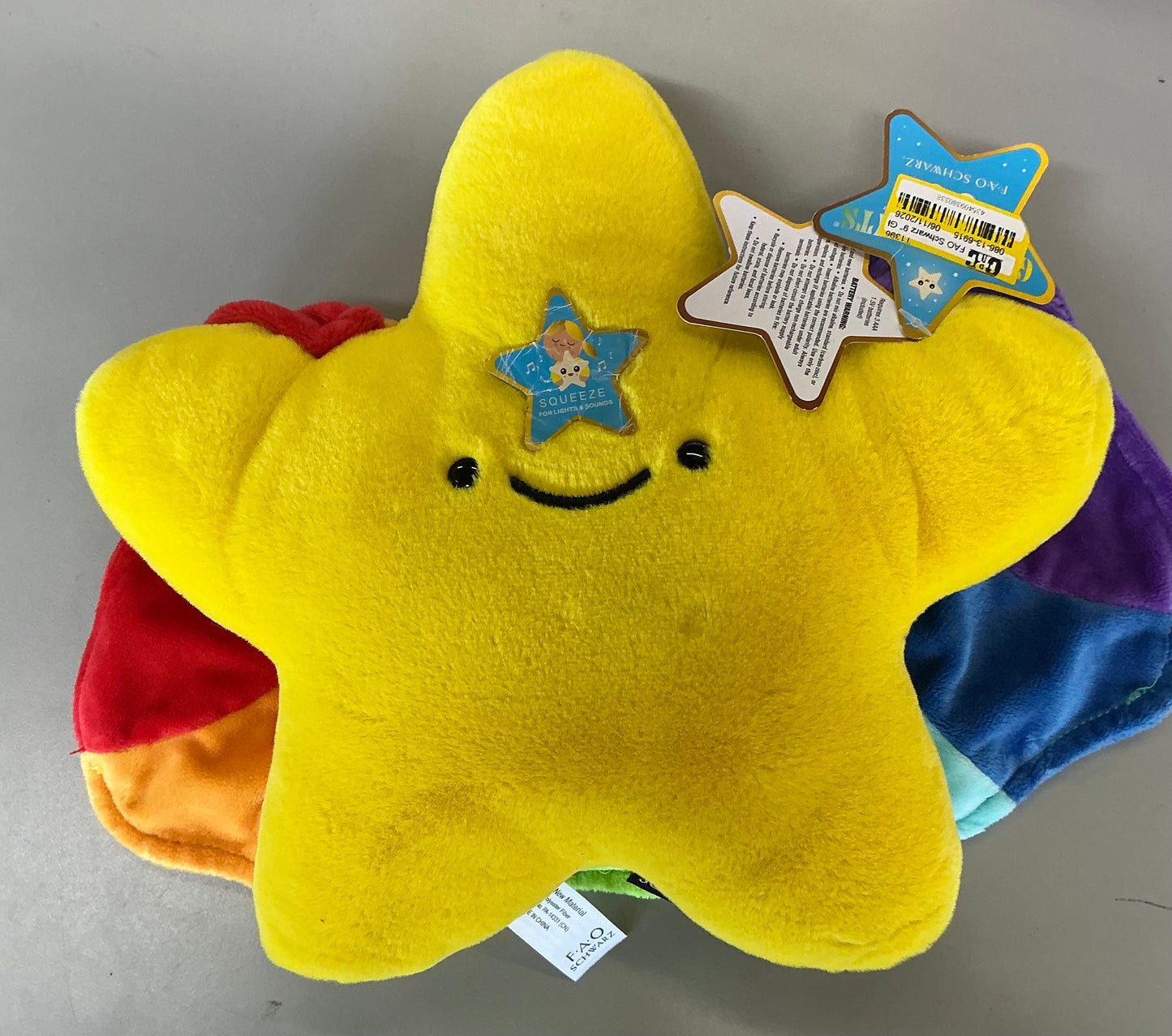 FAO Schwarz 9” glow brights space star plush - SOME MINOR COSMETIC FLAWS