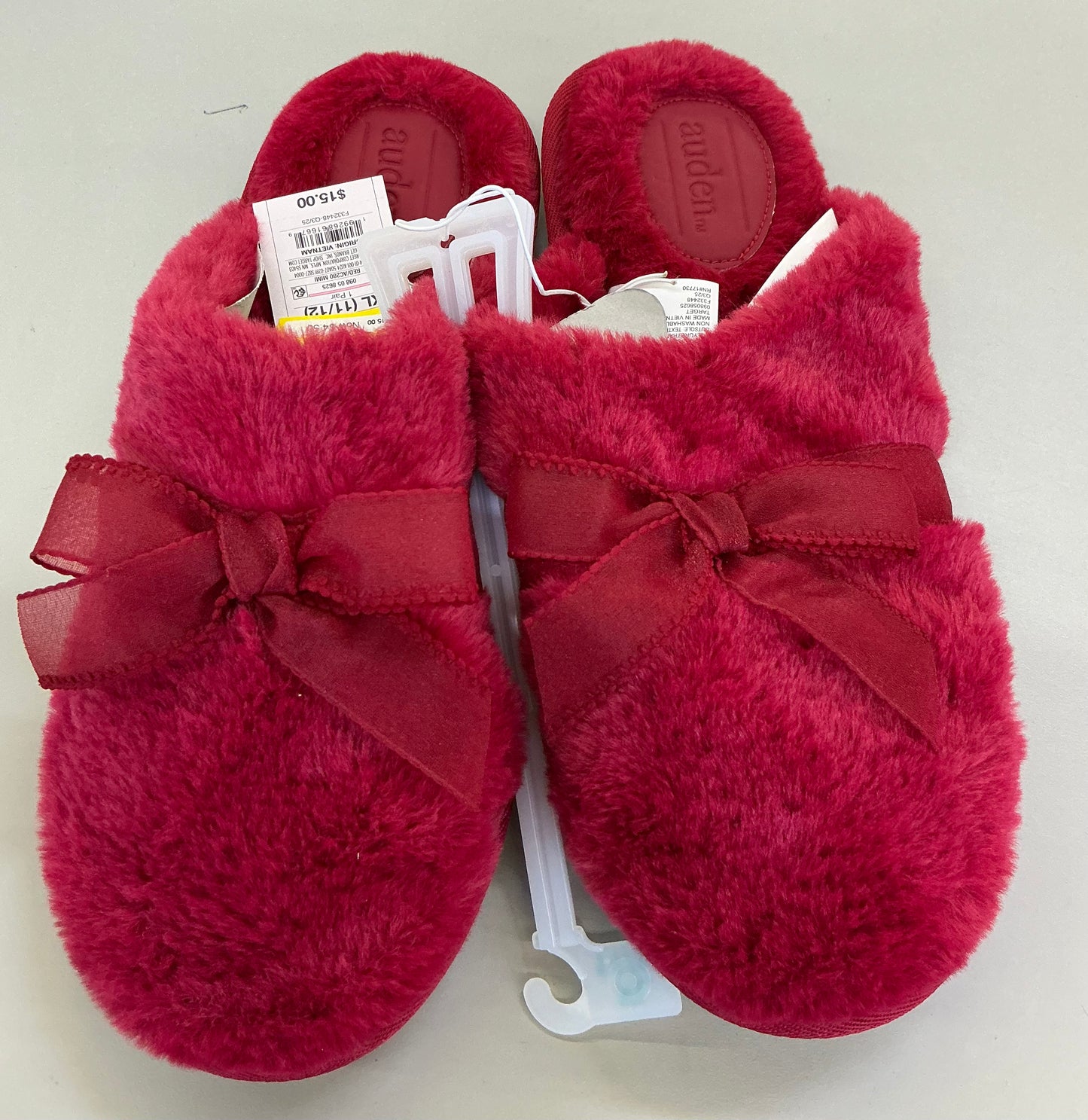 Auden women's faux fur slippers featuring a prominent sheer bow detail