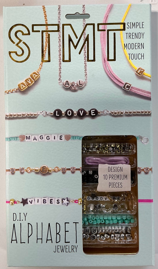 STMT D.I.Y. Alphabet Jewelry Kit in a light blue package designed to create 10 personalized pieces.