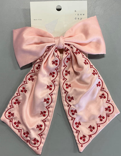 Satin hair bow with hearts embroidery