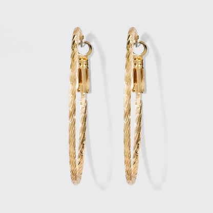 Rose gold plated hoop earrings featuring a textured design