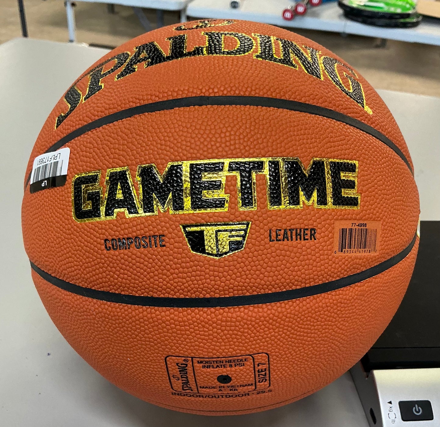 Spalding gametime 29.5” basketball: official size 7, indoor-outdoor use, composite material