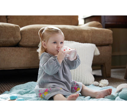 NUK Small Learner 5 oz Sippy Cup in pink with a heart pattern