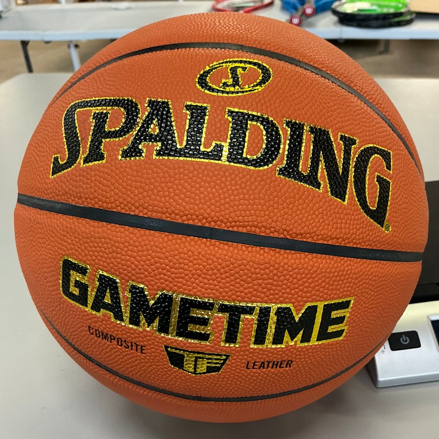Spalding gametime 29.5” basketball: official size 7, indoor-outdoor use, composite material