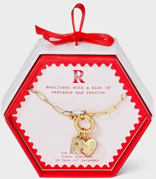 14K gold-dipped heart charm initial necklace featuring a cubic zirconia-accented letter charm and a puffy heart charm on a paperclip chain