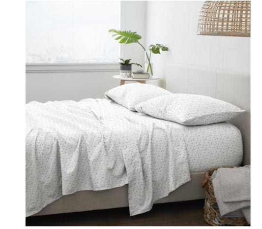 4-Piece King Floral Patterned Sheet Set featuring a light blue floral design on a white background
