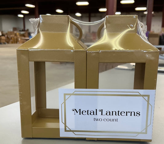 Set of two gold-colored metal lanterns