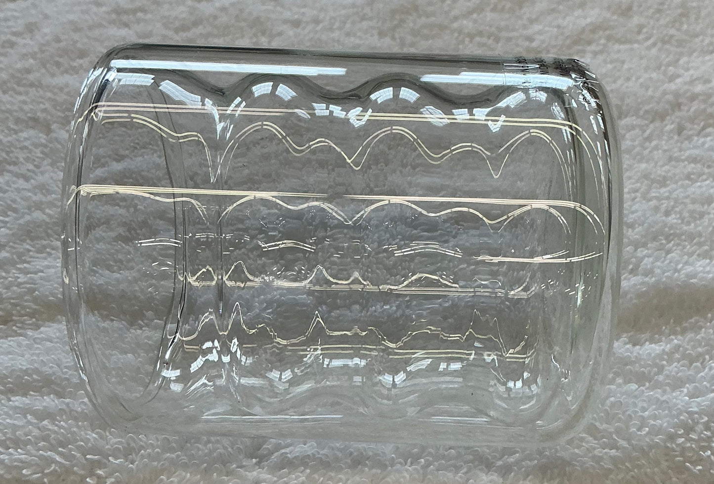 Clear glass Alink ripple bubble tumbler with a unique wavy design