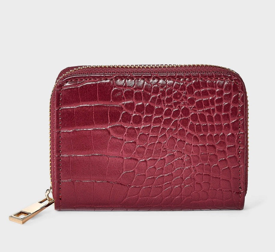 A New Day brand faux crocodile embossed wine-red zip-around wallets