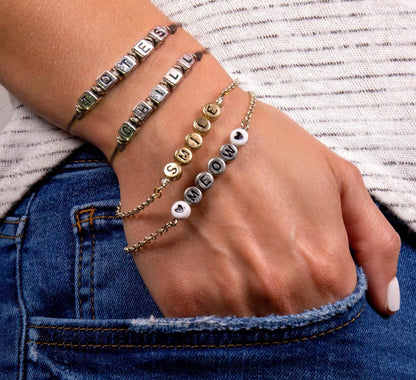 STMT D.I.Y. Alphabet Jewelry Kit in a light blue package designed to create 10 personalized pieces.