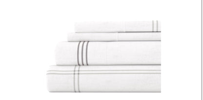 4-piece flannel sheet set for a California King bed in white with gray plaid checks