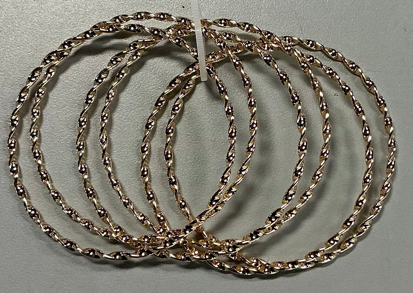 Twisted bangle bracelet gold steel multi strand pull on design, one size fits most-6 pcs