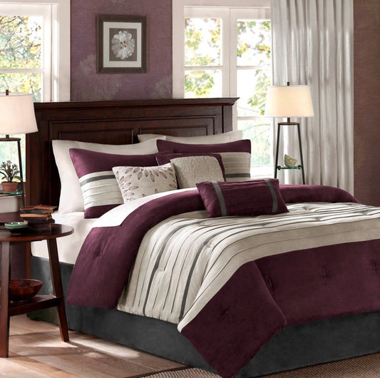 Madison Park 7-Piece Comforter Set in a deep purple color, sized for a King bed