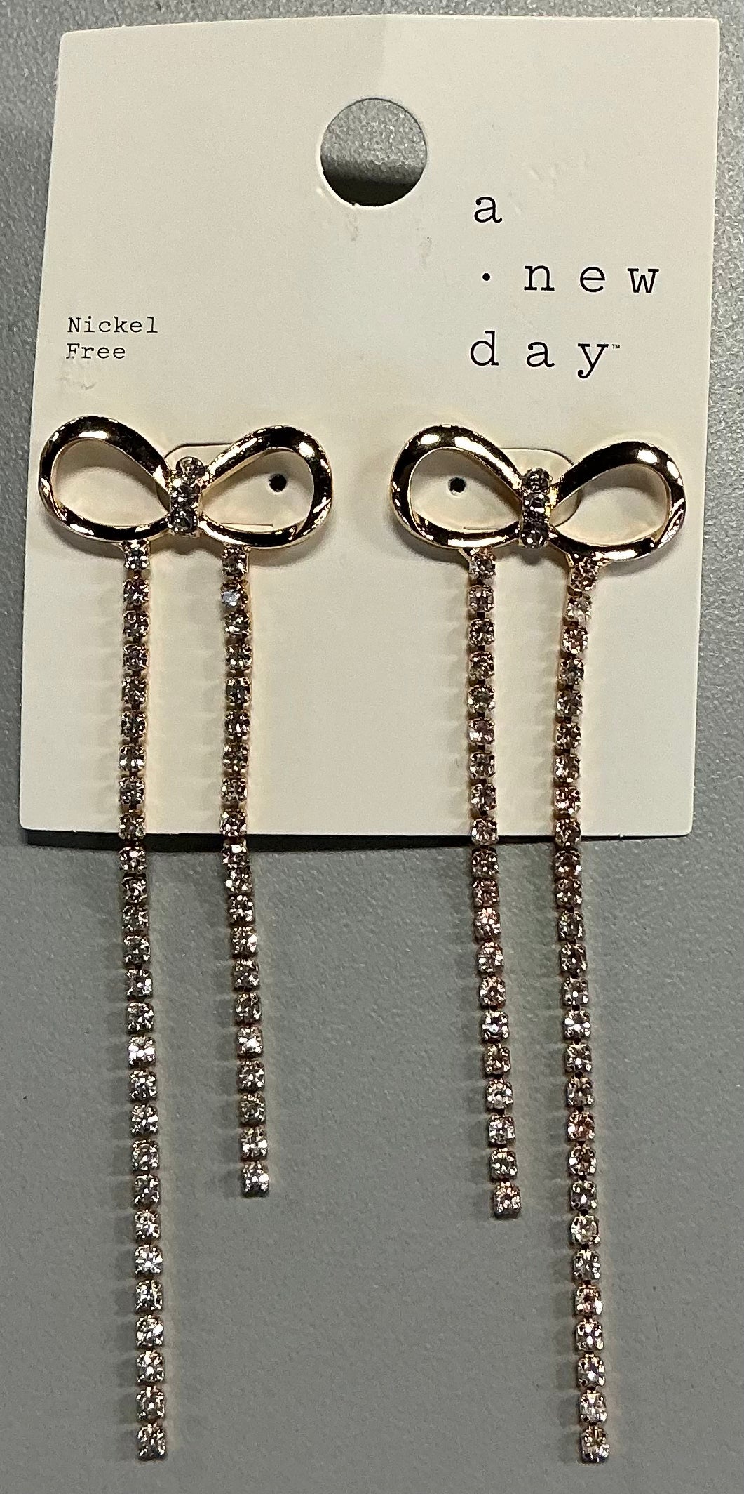 Gold-tone rhinestone bow dangle earrings
