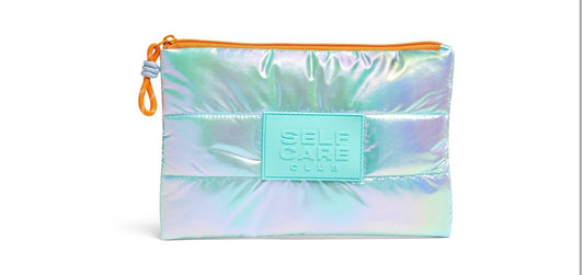 Iridescent puffer pouch featuring a "Self Care Club" patch