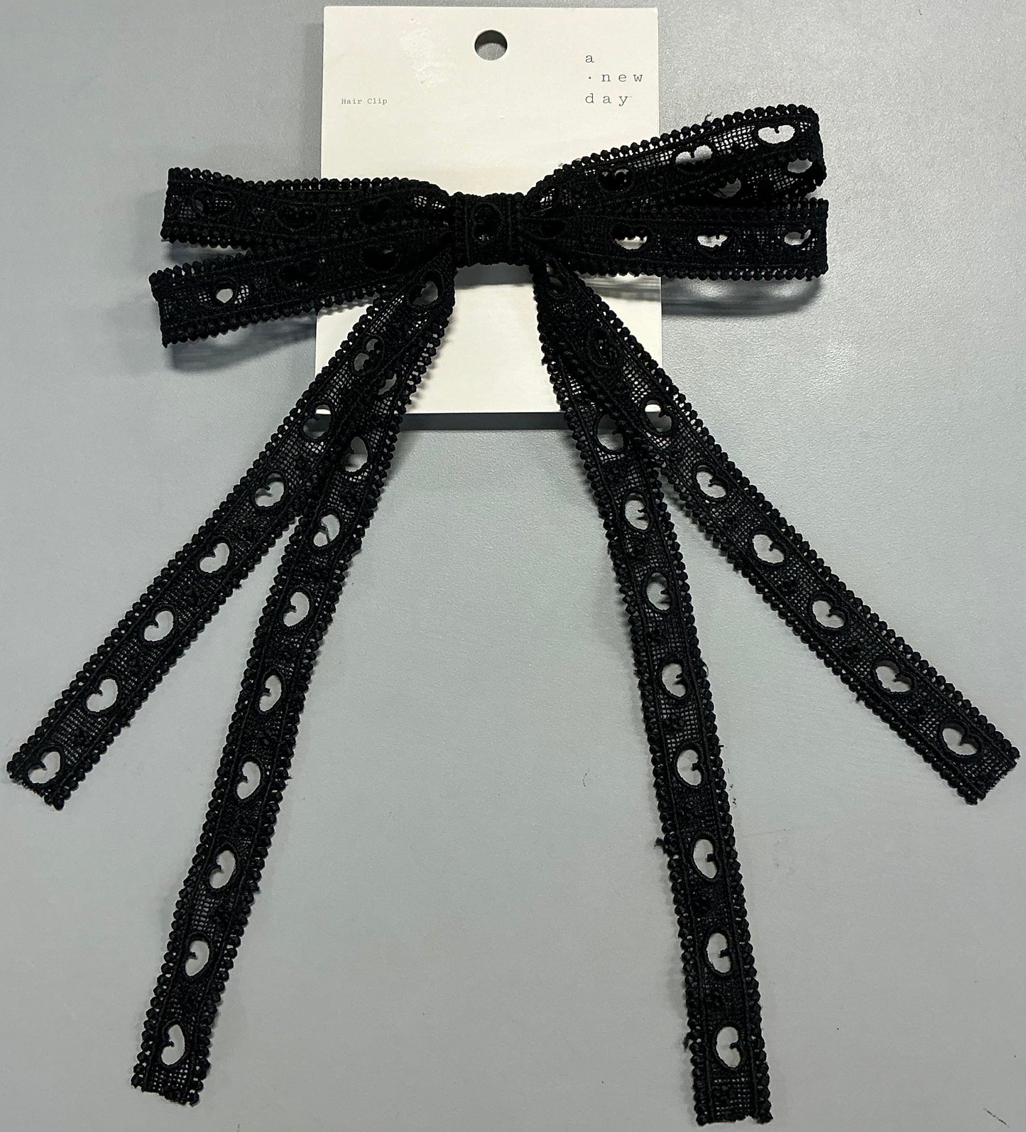 Black heart eyelet double bow hair barrette