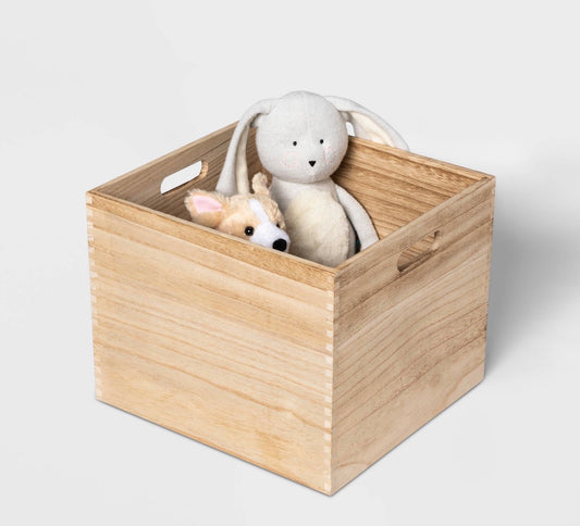 Pillowfort large wooden storage bin featuring a natural wood grain finish and cutout handles 14” L X 13” W X 11” H