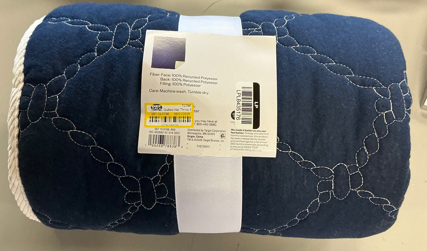 Quilted net throw blanket - blue/neutral - 50x60”