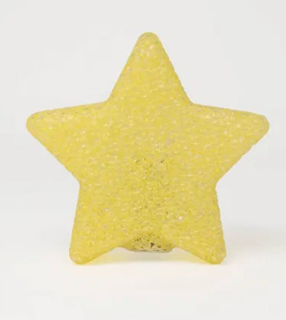 star-shaped novelty light featuring a yellow plastic textured design
