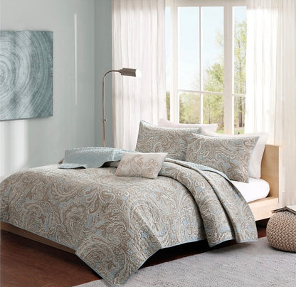Madison Park Pure Ronan 4-Piece blue King/Cal King quilt set featuring a paisley pattern