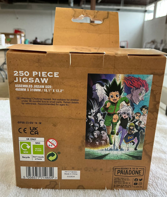 Paladone Hunter x Hunter 250-piece jigsaw puzzle packaged in a collectible metal storage tin
