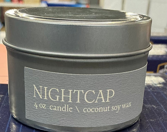 4 oz coconut soy wax candle in a grey tin labeled "NIGHTCAP