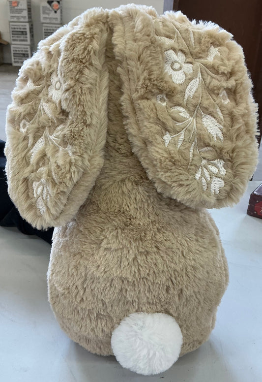 novelty bunny plush pillow in beige featuring embroidered floral details on the ears