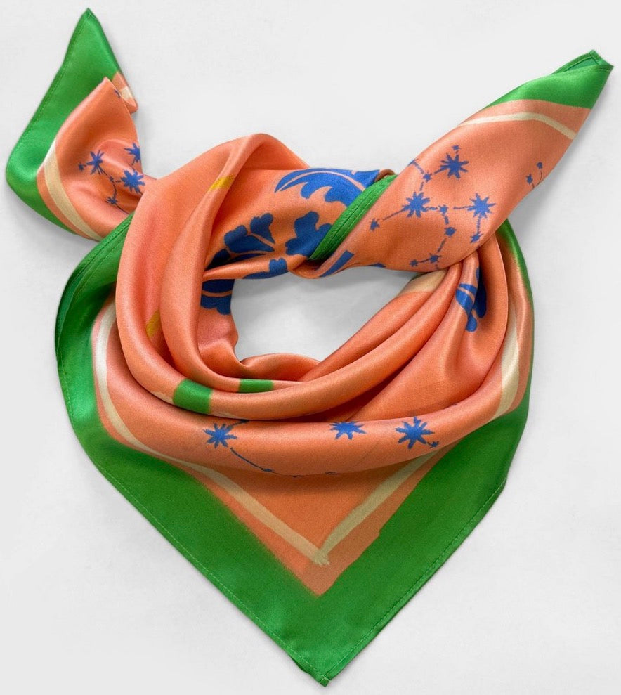 Zodiac printed square silk scarf in the Sagittarius design featuring an apricot orange color-32in x 32in
