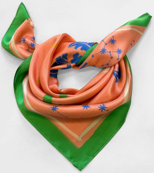 Zodiac printed square silk scarf in the Sagittarius design featuring an apricot orange color-32in x 32in