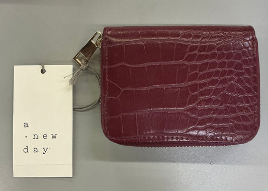 A New Day brand faux crocodile embossed wine-red zip-around wallets