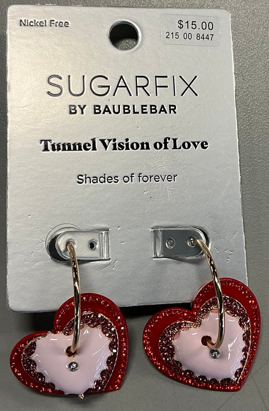 Sugarfix by BaubleBar heart-shaped hoop earrings featuring a red and pink layered design