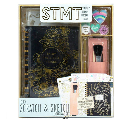 STMT DIY Scratch & Sketch Journal Set featuring a black journal with gold floral accents.