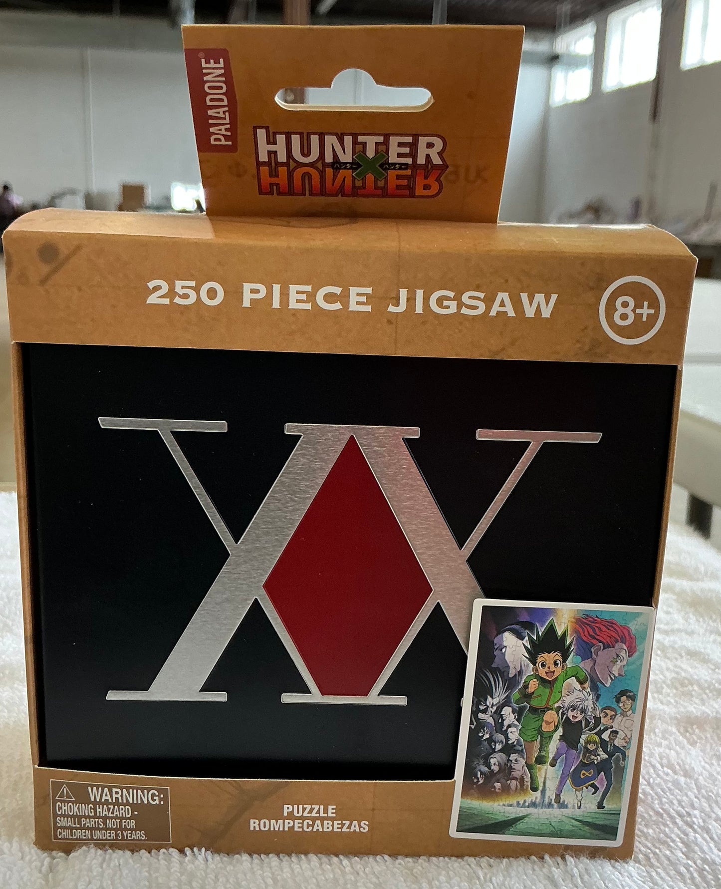 Paladone Hunter x Hunter 250-piece jigsaw puzzle packaged in a collectible metal storage tin