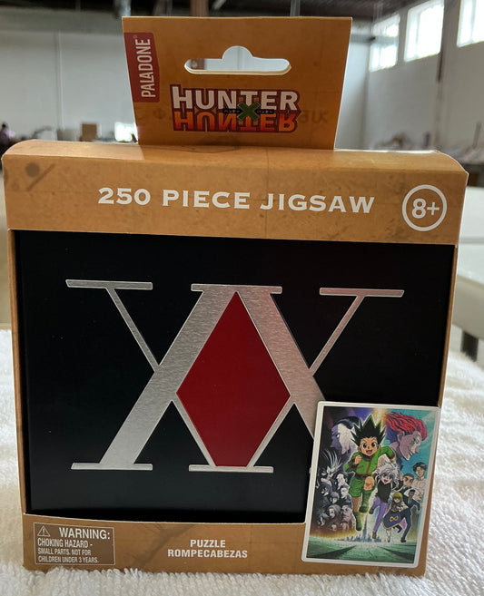 Paladone Hunter x Hunter 250-piece jigsaw puzzle packaged in a collectible metal storage tin